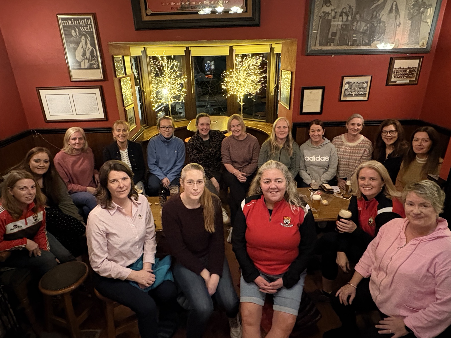 A large community group gathered inside Coolera House